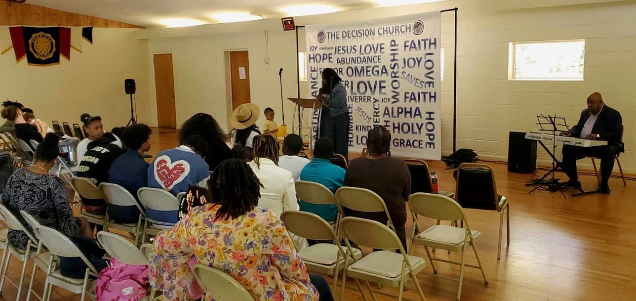 People gathered for music and fellowship at The Decision Christian Assembly