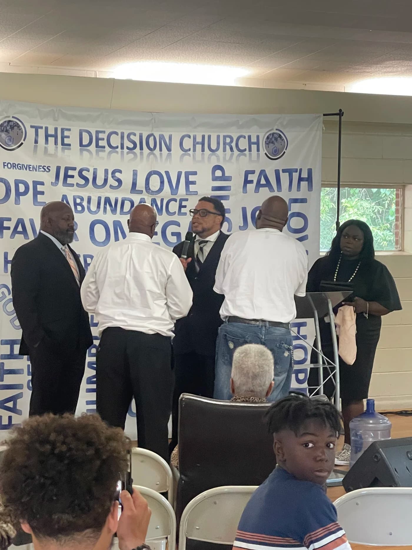 Ministry and prayer during a Decision Church gathering